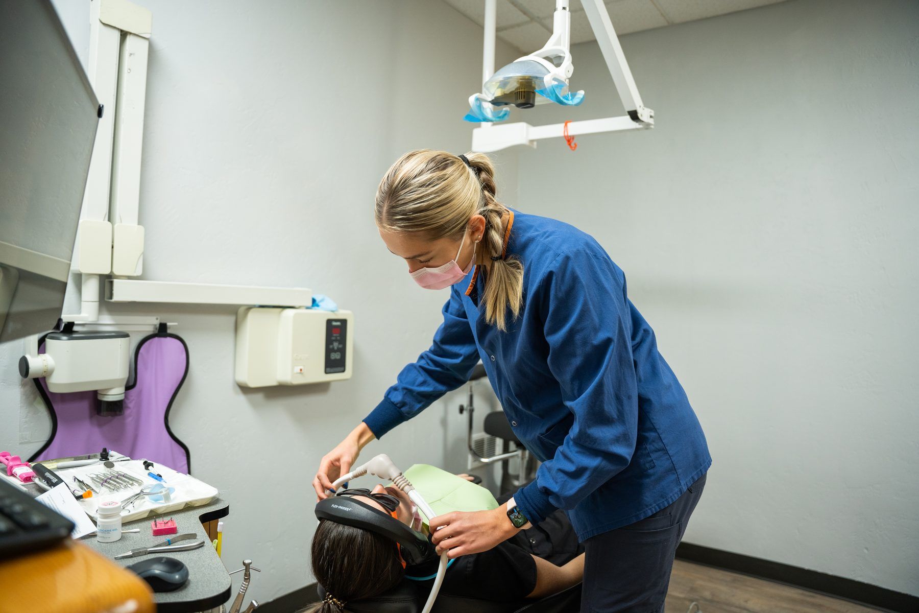 Dr. Scott welcoming a young patient